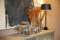 Lioni, Snoeppot, Glas, L